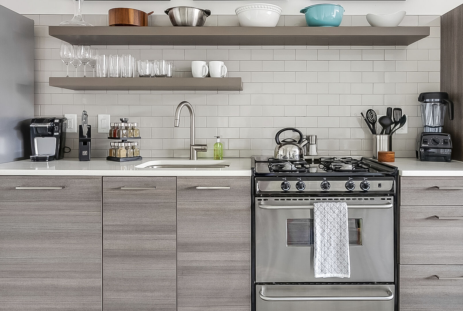 The oven and sink of the kitchen.