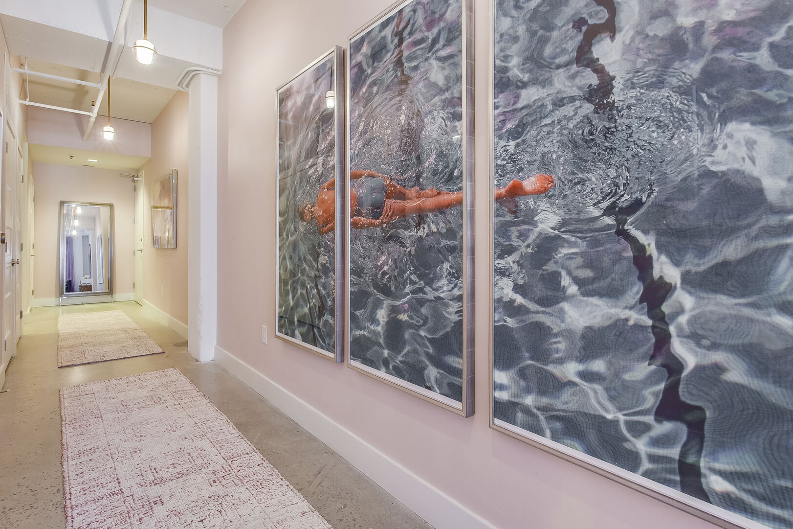 Hallway in Downtown Atlanta Rental Features Art Work.