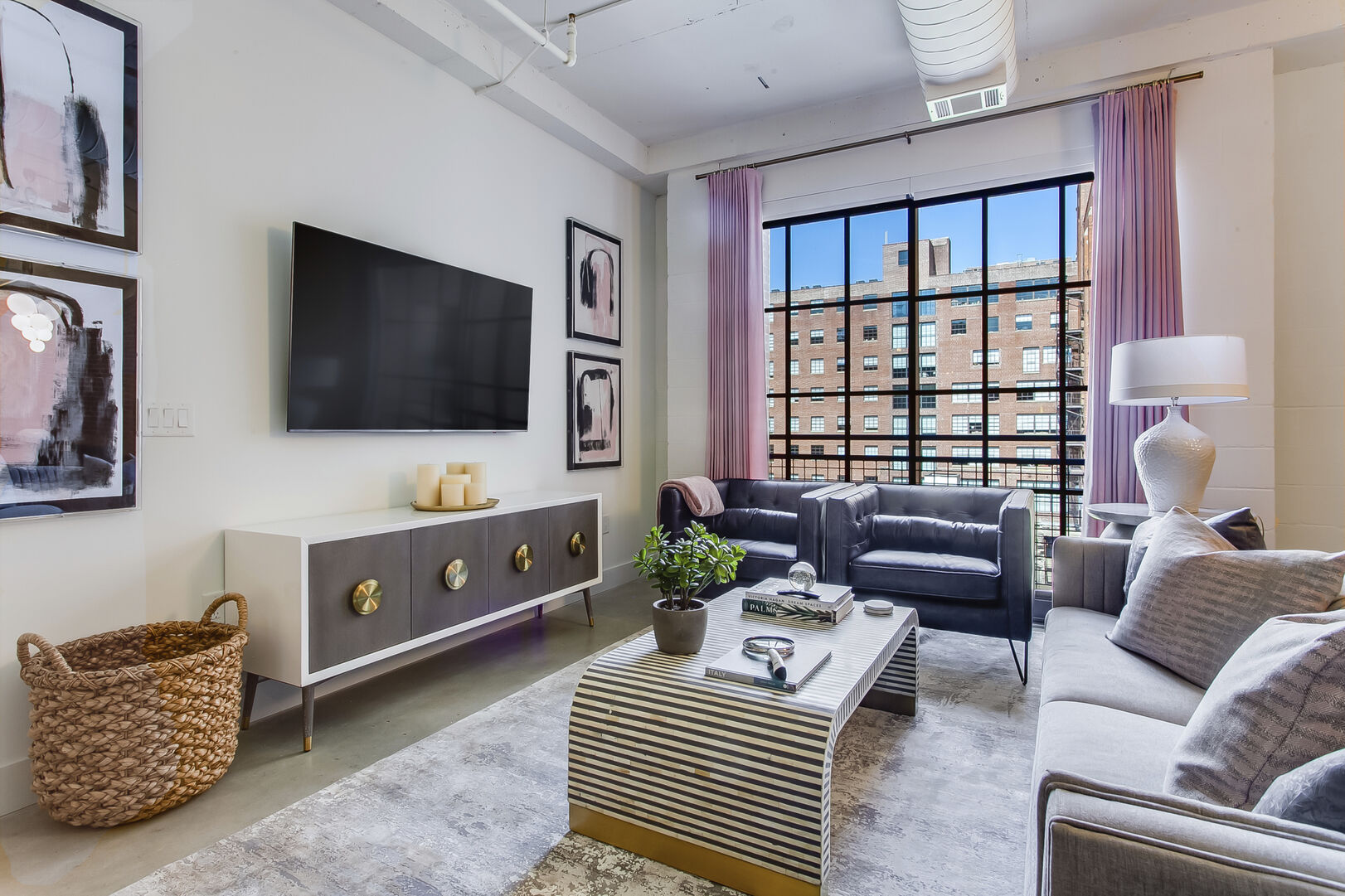 Living Area Includes a Sofa and Two Accent Chairs.