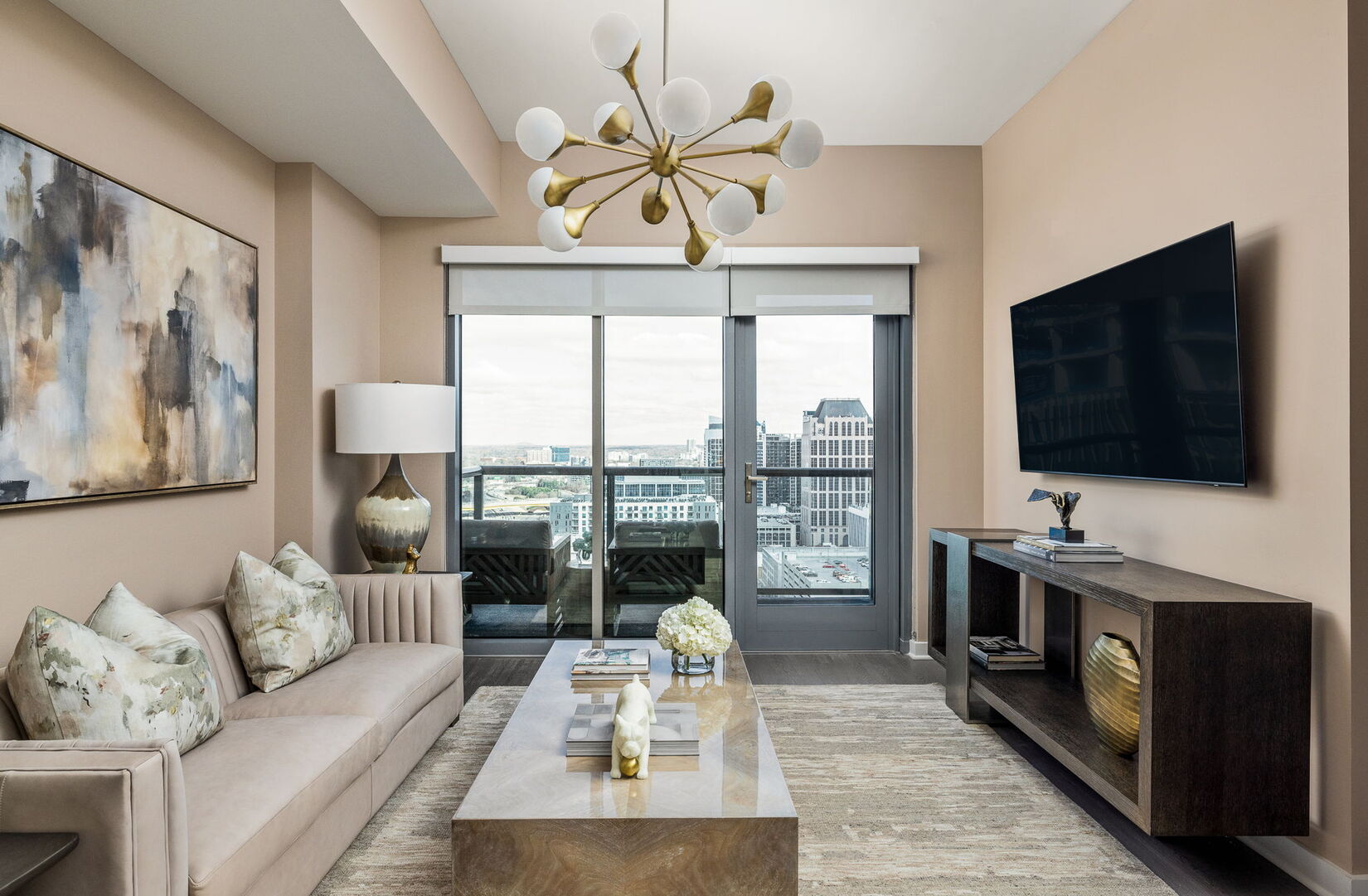 Living room featuring a 65 4K UHD TV