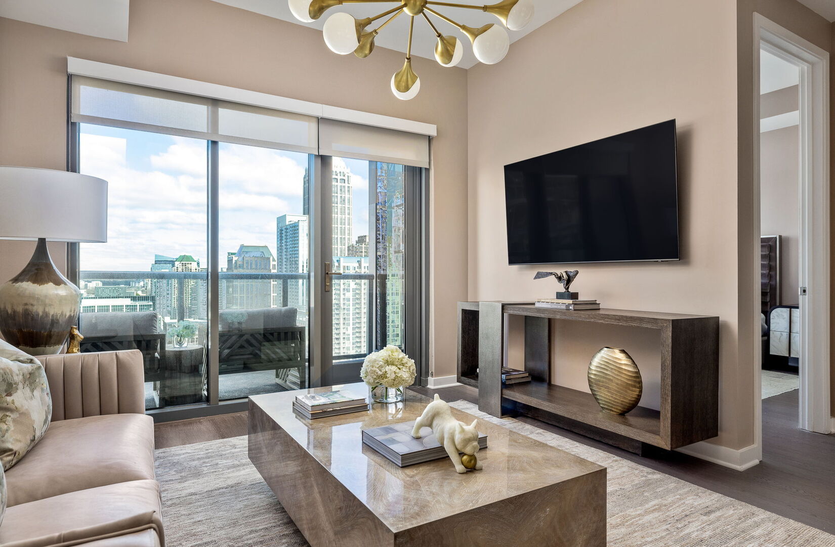 Living room featuring a 65 4K UHD TV