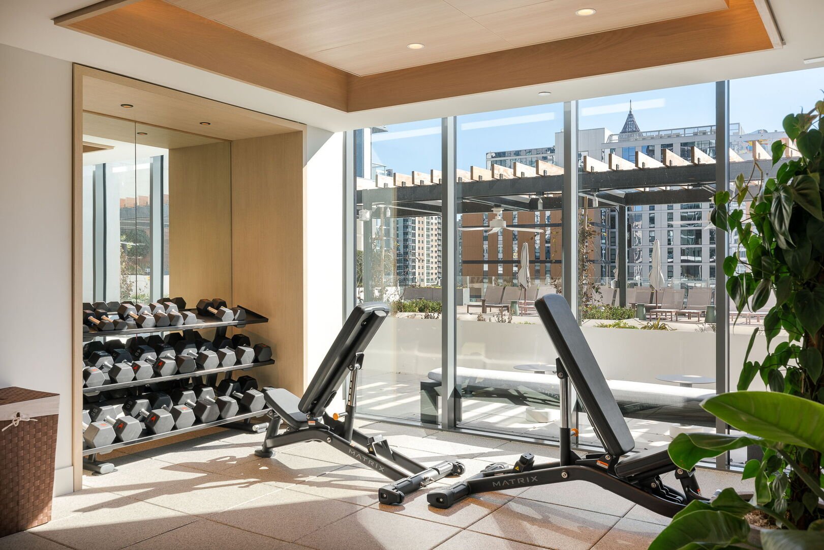 Gym featuring a dedicated barbell station