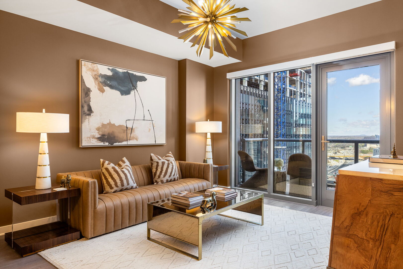 Living room featuring a 65 4K UHD TV