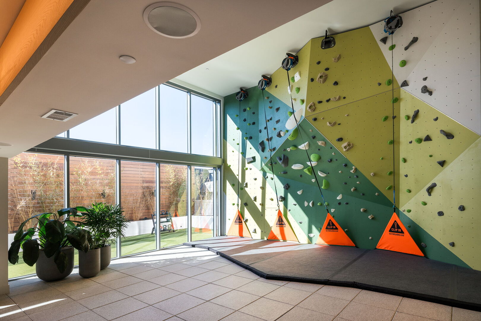 Fitness studio featuring a rock wall