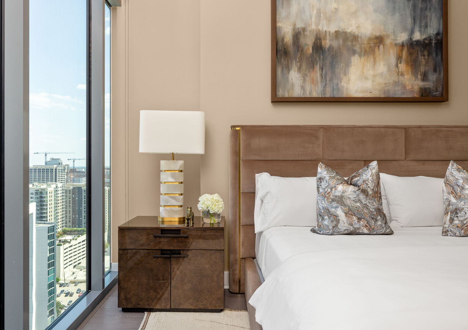 Primary suite with a king bed and a 55 4K UHD TV