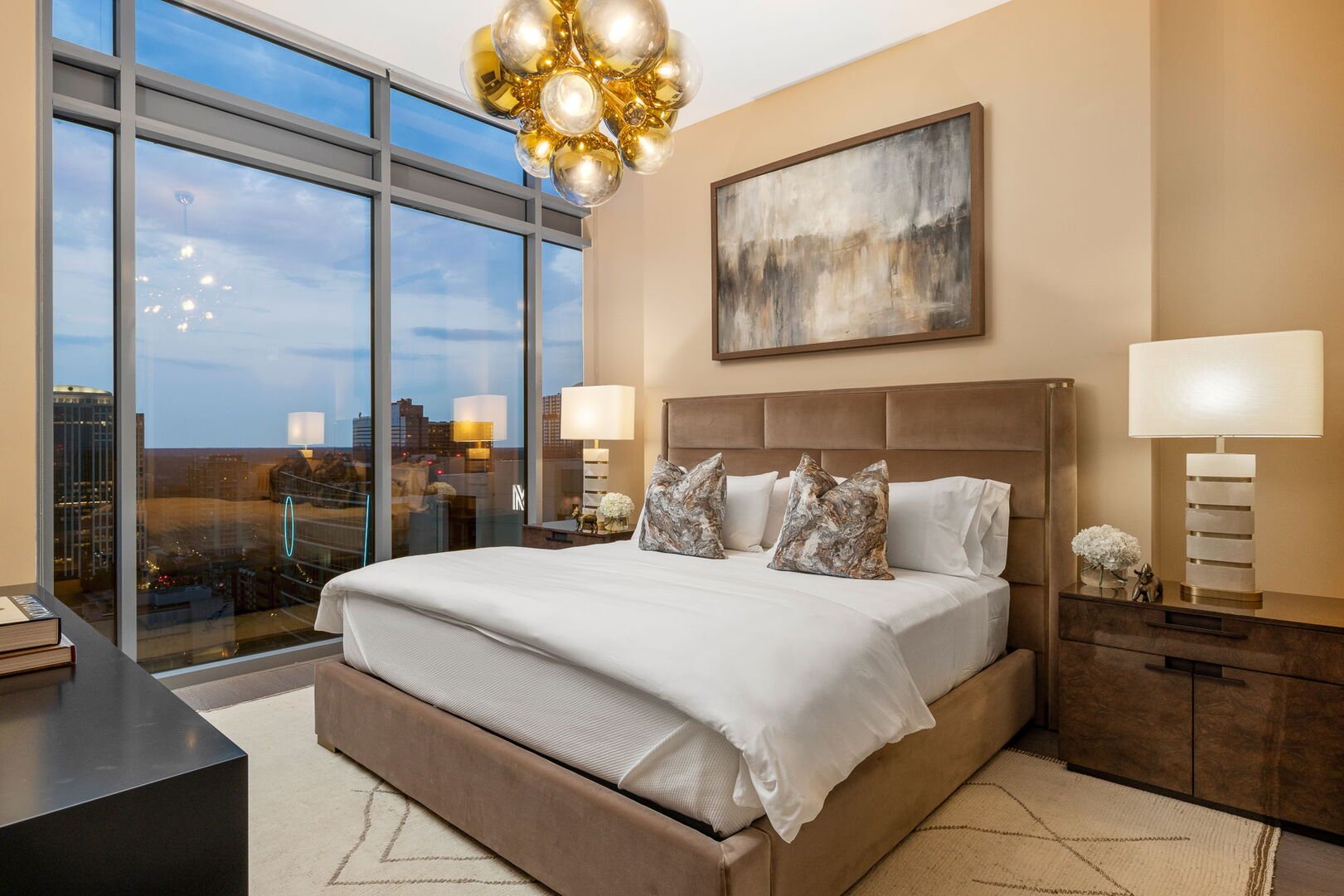 Primary suite with a king bed and a 55 4K UHD TV