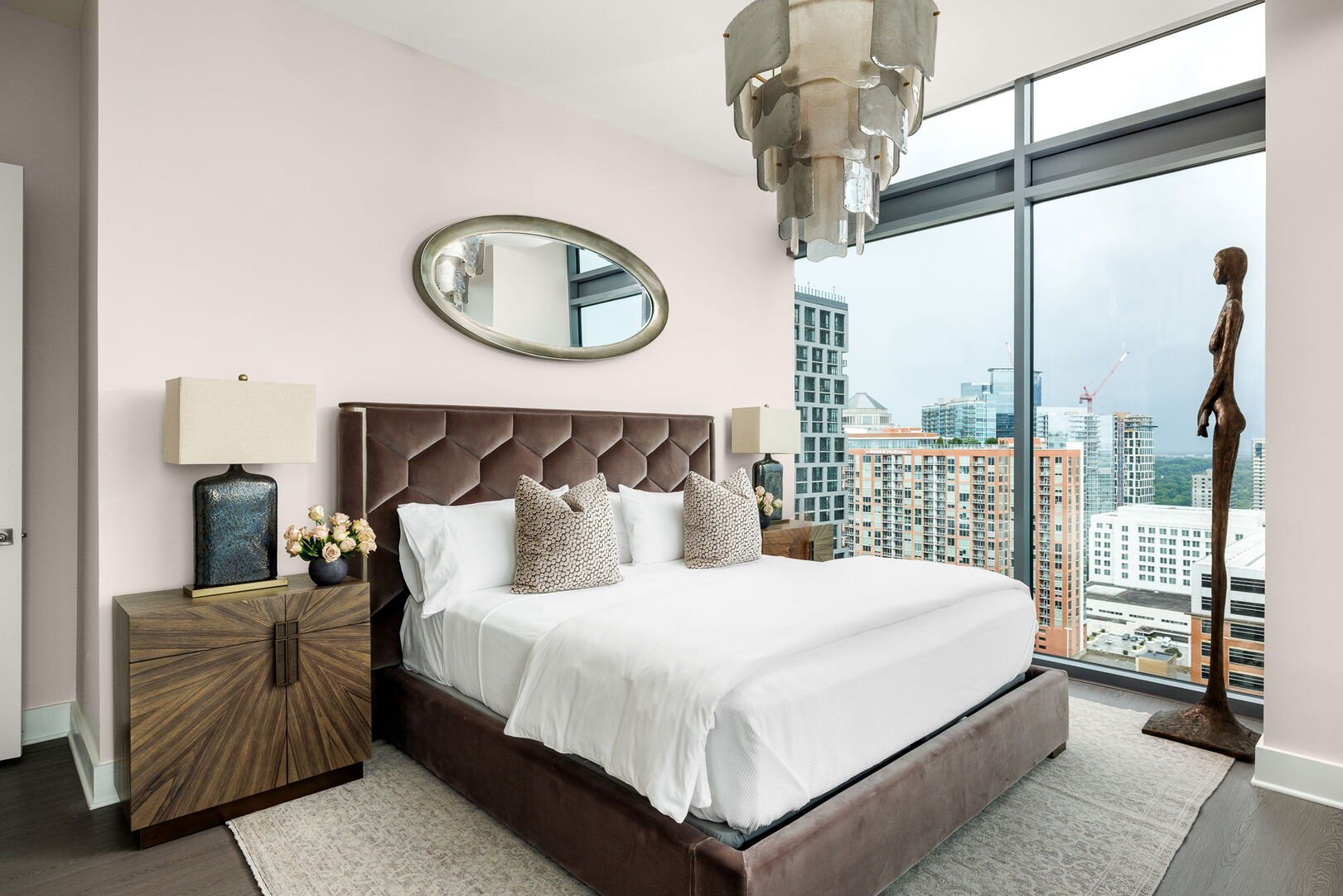 Primary suite with a king bed and a 55 4K UHD TV