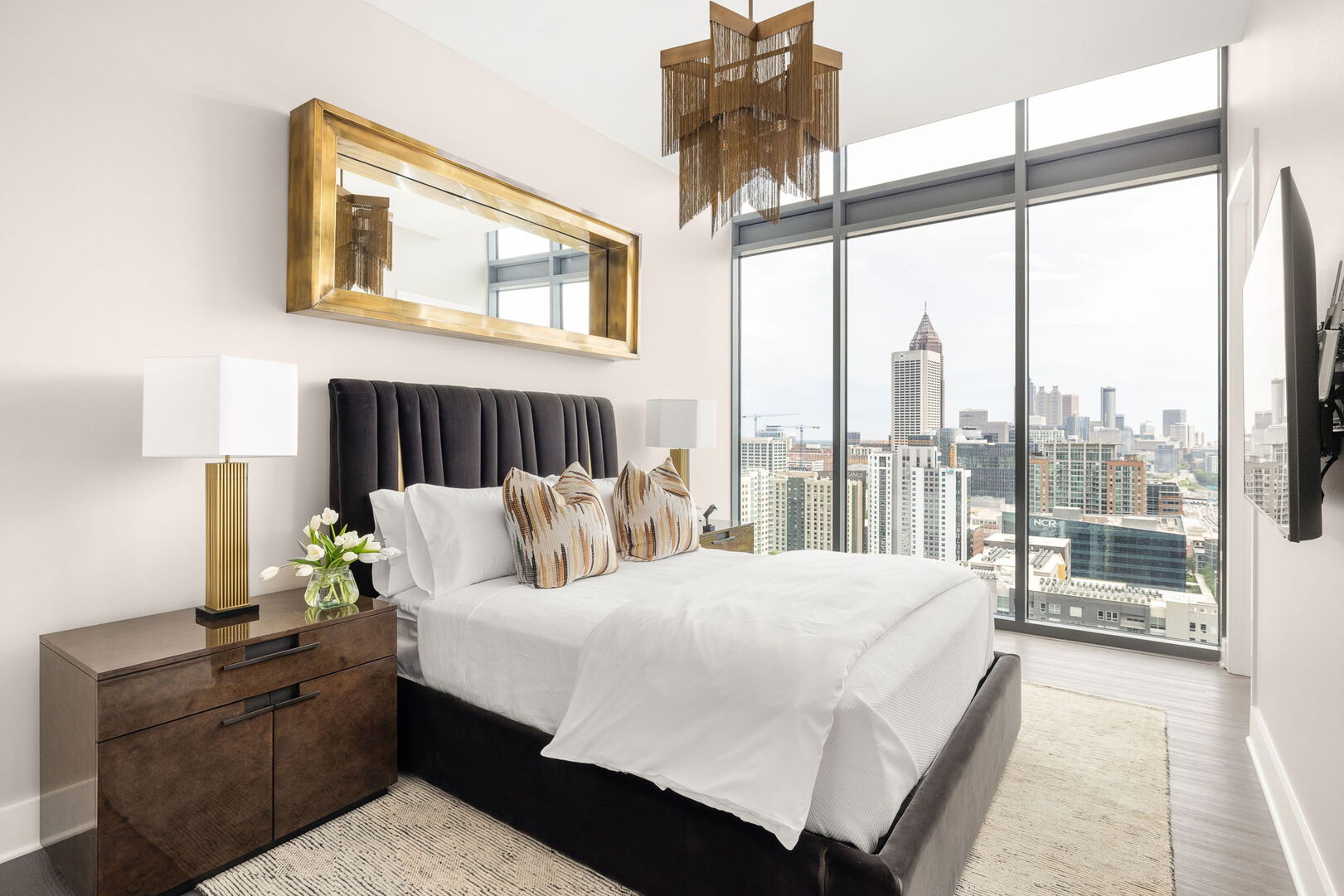 Guest suite with a queen bed and a 55 4K UHD TV