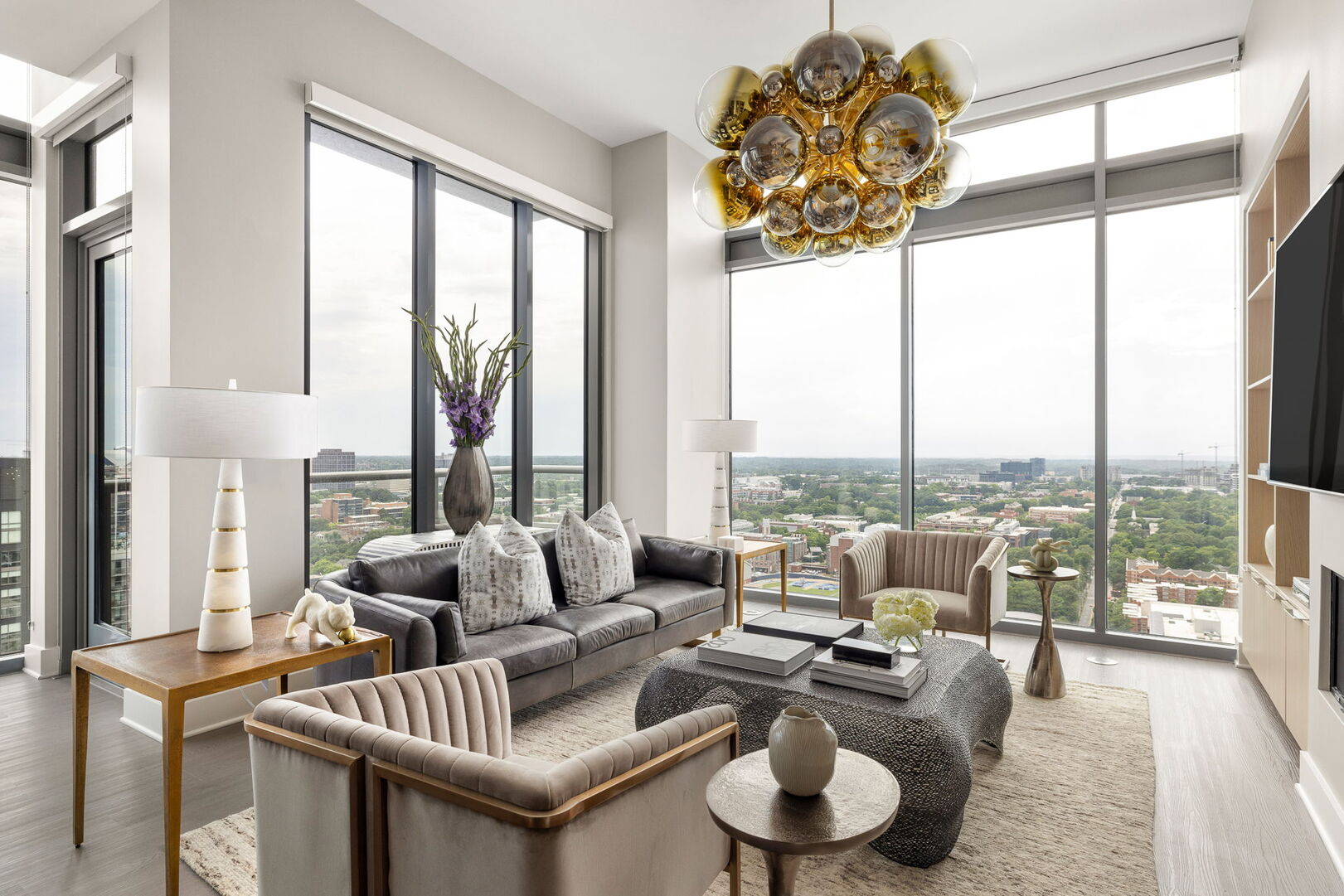 Living room featuring a 65 4K UHD TV