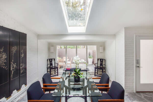 Dining Table, Chairs, Seating Area with Coffee Table and Chairs.