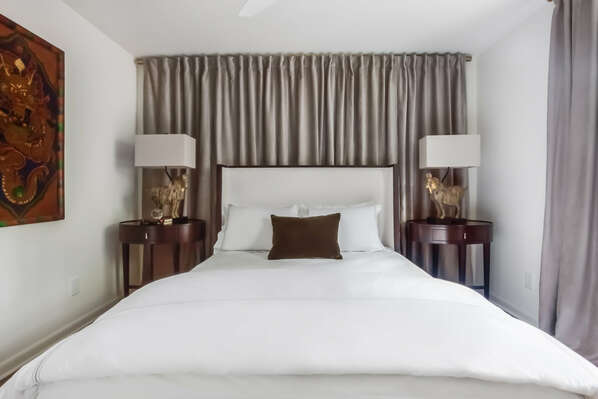 Large Bed, Nightstands, and Lamps.