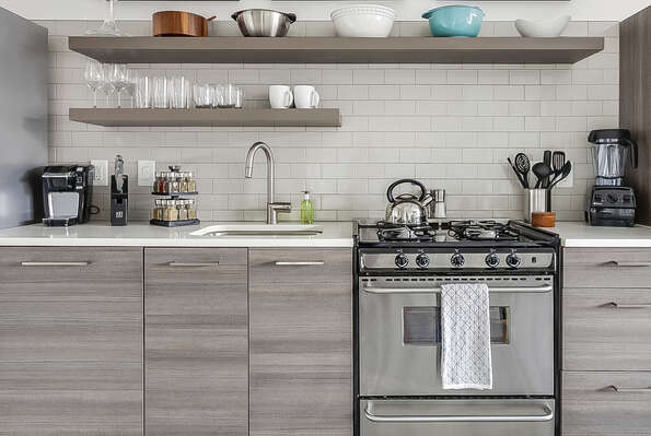 The oven and sink of the kitchen.