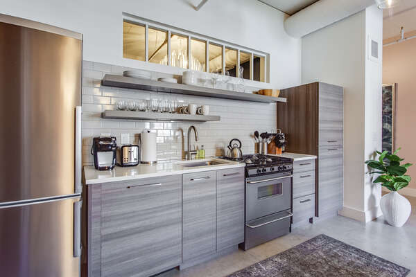 Modern Kitchen Includes Stainless Steel Appliances.