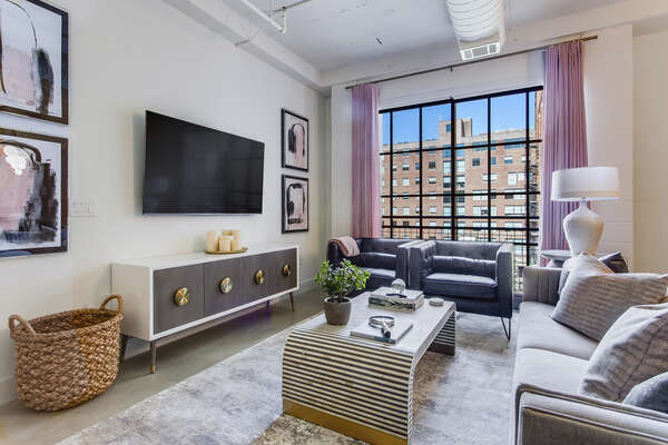 Living Area Includes a Sofa and Two Accent Chairs.
