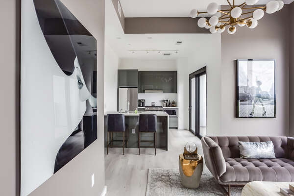 Living Area with Sofa and View into Kitchen