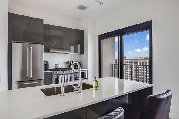 Fully Equipped Kitchen with Balcony Access