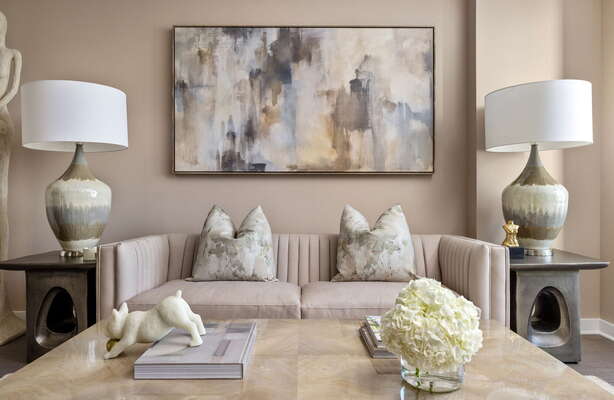 Living room featuring a 65 4K UHD TV