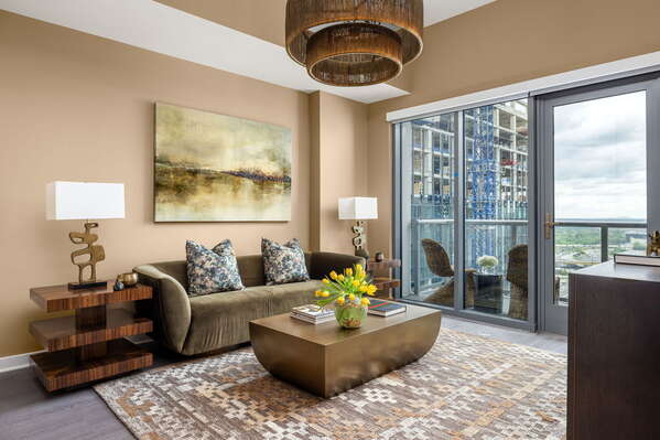 Living room featuring a 65 4K UHD TV