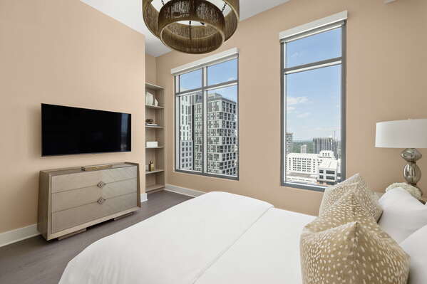 Guest suite with a queen bed and a 55 4K UHD TV