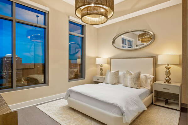 Guest suite with a queen bed and a 55 4K UHD TV