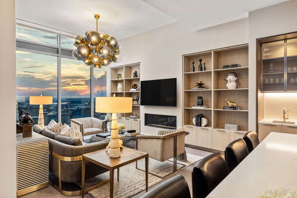 Living room featuring a 65 4K UHD TV