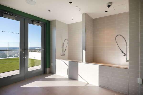 Dog wash station and dedicated dog walking area